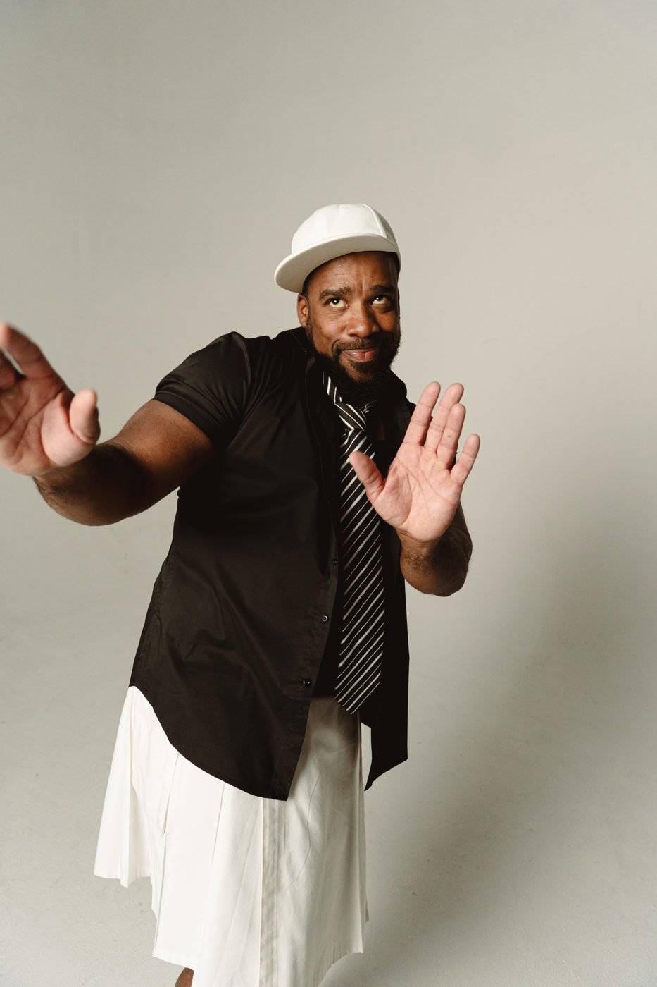 Bad Juju mid-gesture during a promo shoot